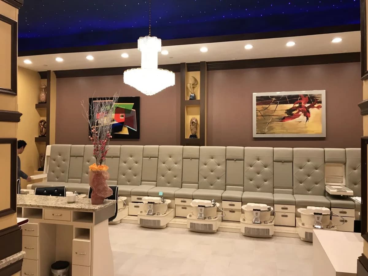 Pedicure lounge with crystal chandelier at Belle Palace Nail Spa